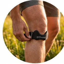 Hands placing OrthoZen directly below the kneecap